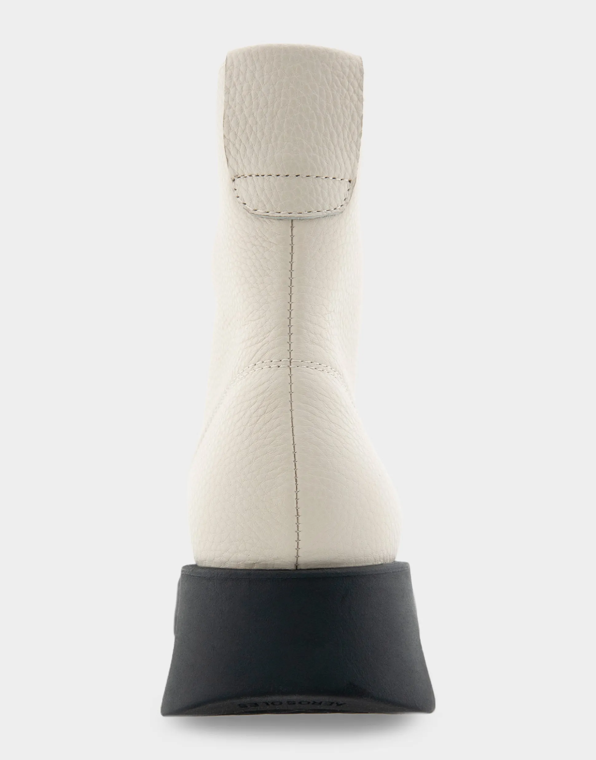 Comfortable Women's Flexible Molded Unit Front Zip Bootie in Eggnog Pebbled Leather